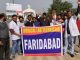 Lab technicians of Faridabad demonstrated at Rose Garden to protest against the action being taken against medical lab technicians