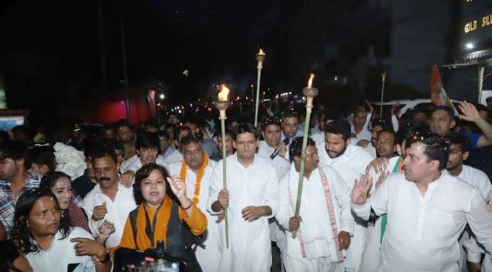 Crowd of people gathered in the huge torch procession taken out in Faridabad